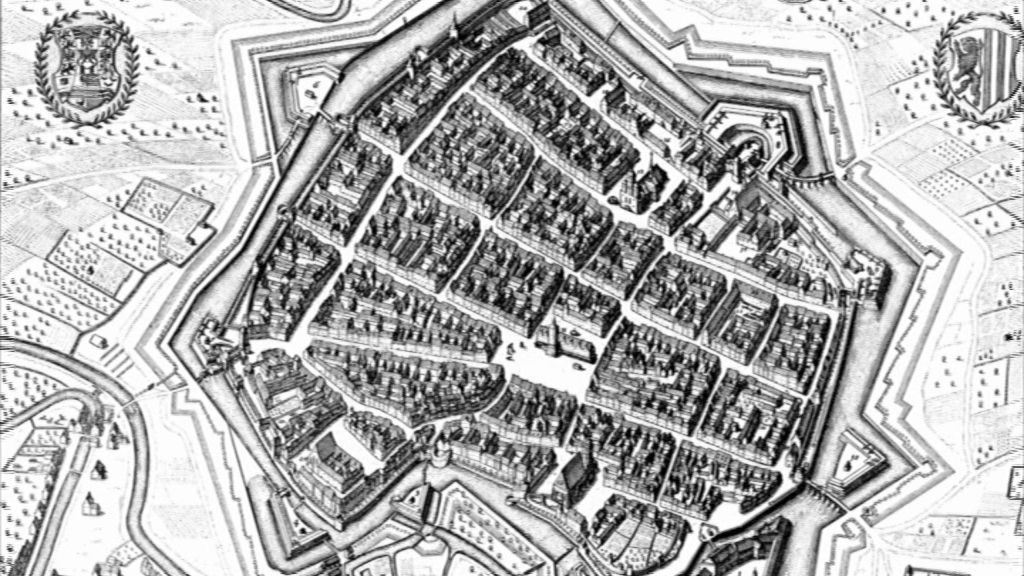 Historische Stadtkarte einer befestigten Stadt mit Straßen, Gebäuden und Stadtmauern.