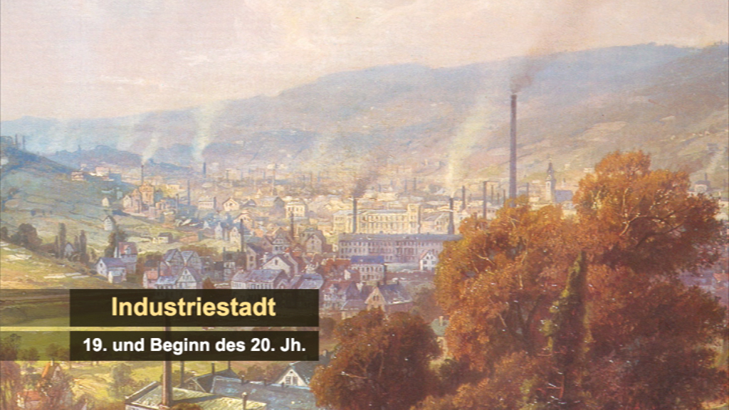 Darstellung einer Industriestadt aus dem 19. und Beginn des 20. Jahrhunderts mit Fabriken und rauchenden Schornsteinen.