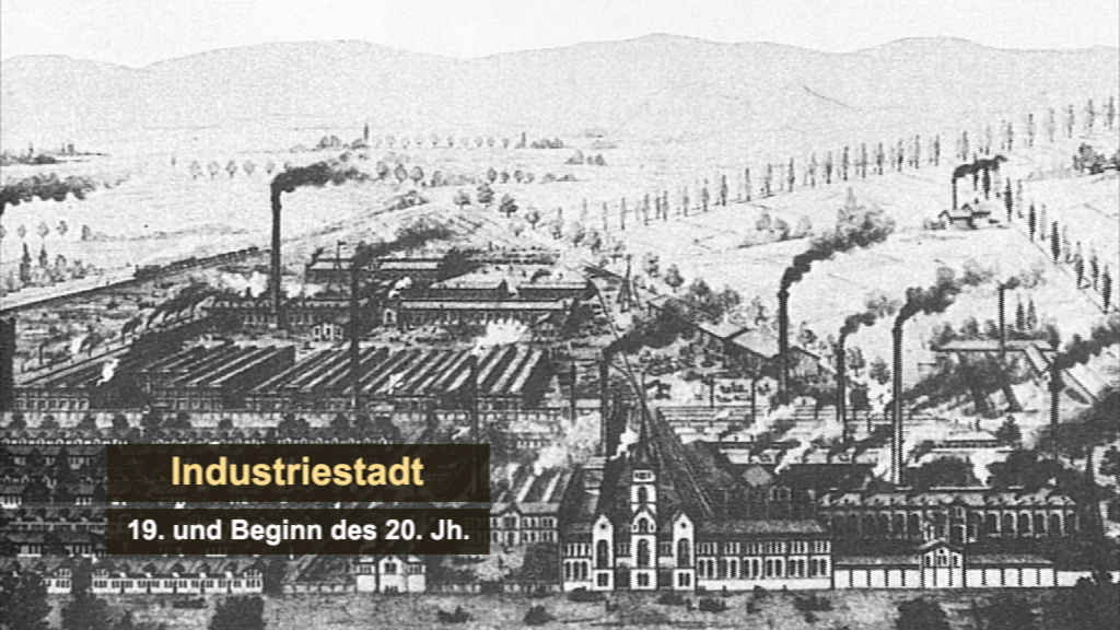 Historische Darstellung einer Industriestadt im 19. und frühen 20. Jahrhundert mit Fabriken und rauchenden Schornsteinen.