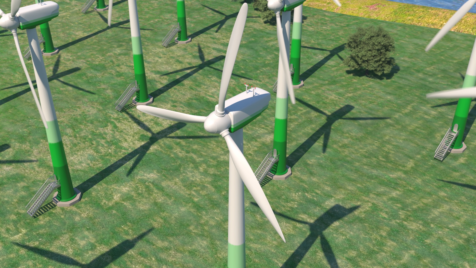 Luftaufnahme eines Windparks mit mehreren Windkraftanlagen auf einer grünen Wiese.