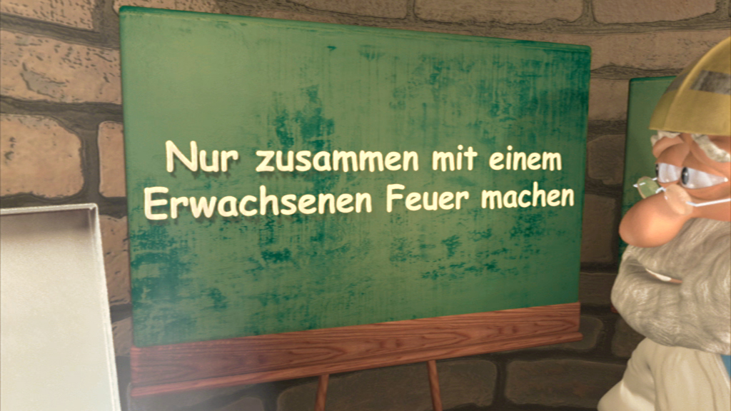 Ein grünes Schild mit der Aufschrift 'Nur zusammen mit einem Erwachsenen Feuer machen' in einer Steinmauer-Umgebung.