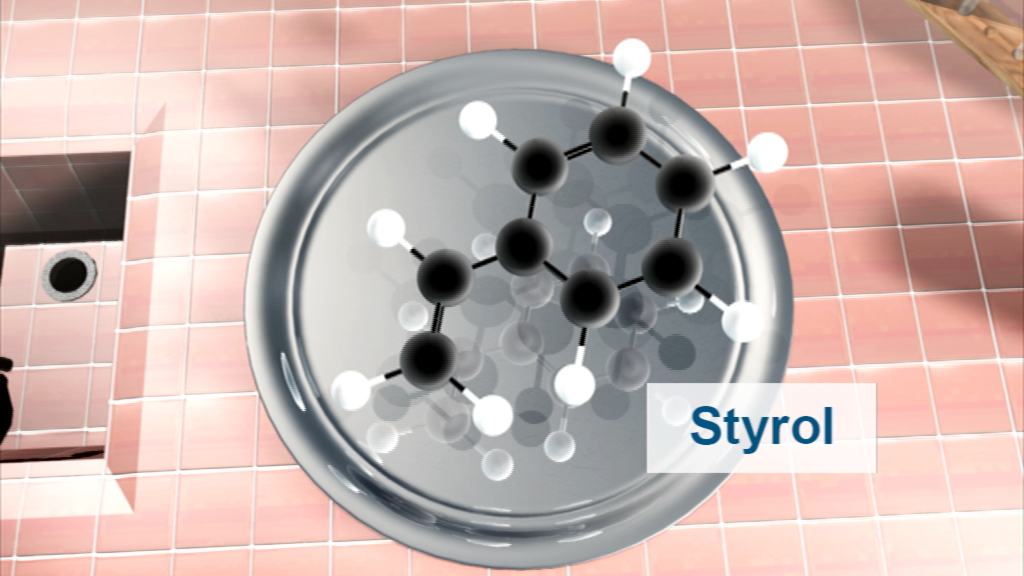 Molekülstruktur von Styrol mit schwarzem und weißem Ballmodell auf einem grauen Teller.