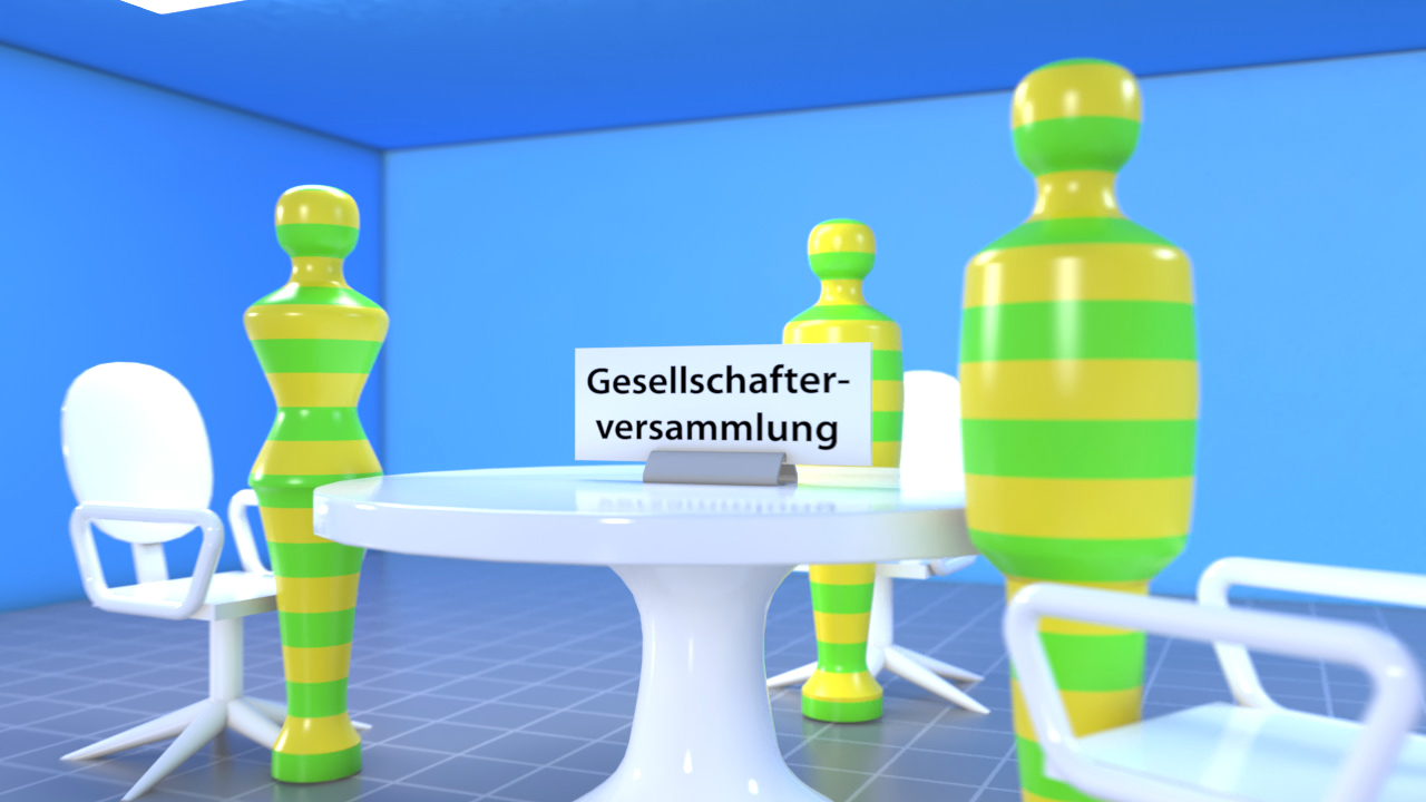Ein runder Tisch in einem blauen Raum, umgeben von bunten Figuren und einem Schild mit der Aufschrift 'Gesellschafterversammlung'.
