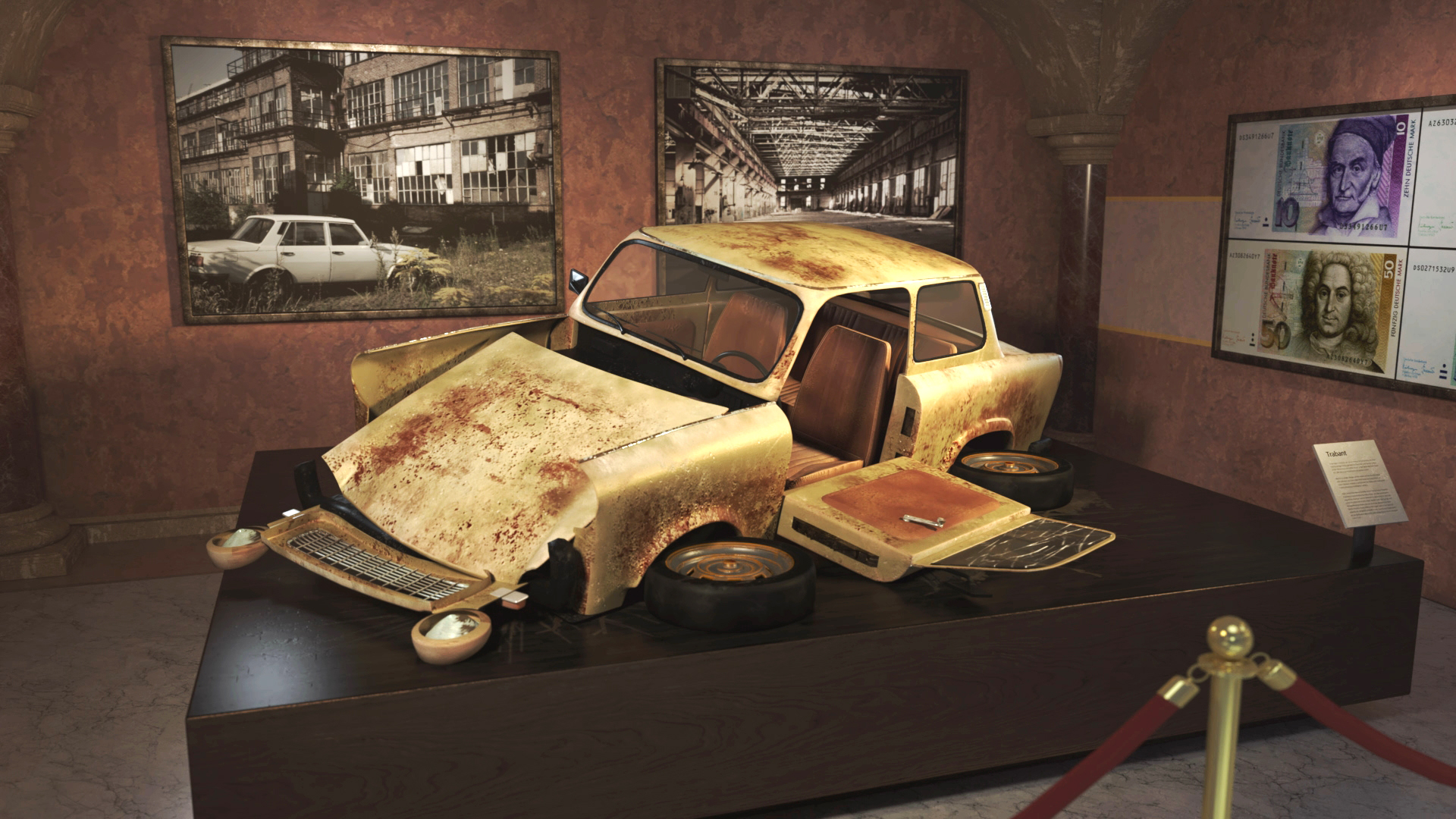 Ein rostiger, zerlegter Oldtimer auf einem Ausstellungstisch in einem Museum, umgeben von historischen Fotografien.