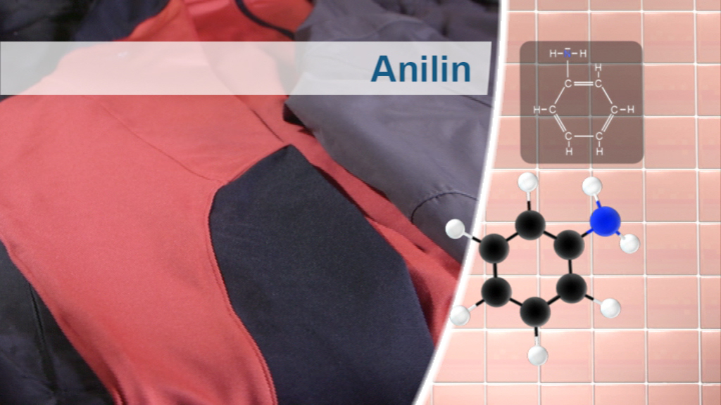 Ein rotes Kleidungsstück mit schwarzen Akzenten, daneben eine chemische Strukturformel für Anilin.
