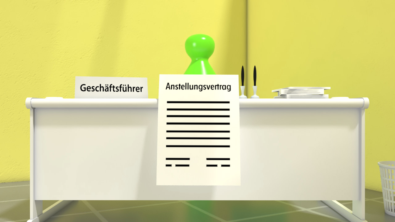 Ein Schreibtisch mit einem grünen Objekt, einem Schild mit 'Geschäftsführer' und einem Anstellungsvertrag.