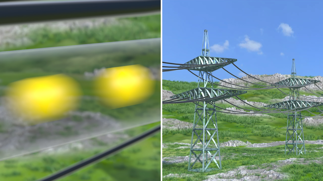 Zwei Hochspannungsleitungen mit gelben Isolatoren vor einer grünen Landschaft.